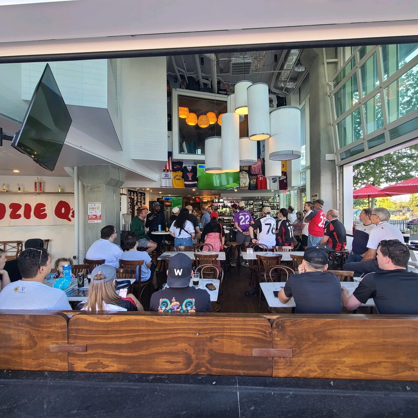 Garage doors open on a match day at Suzie Q's