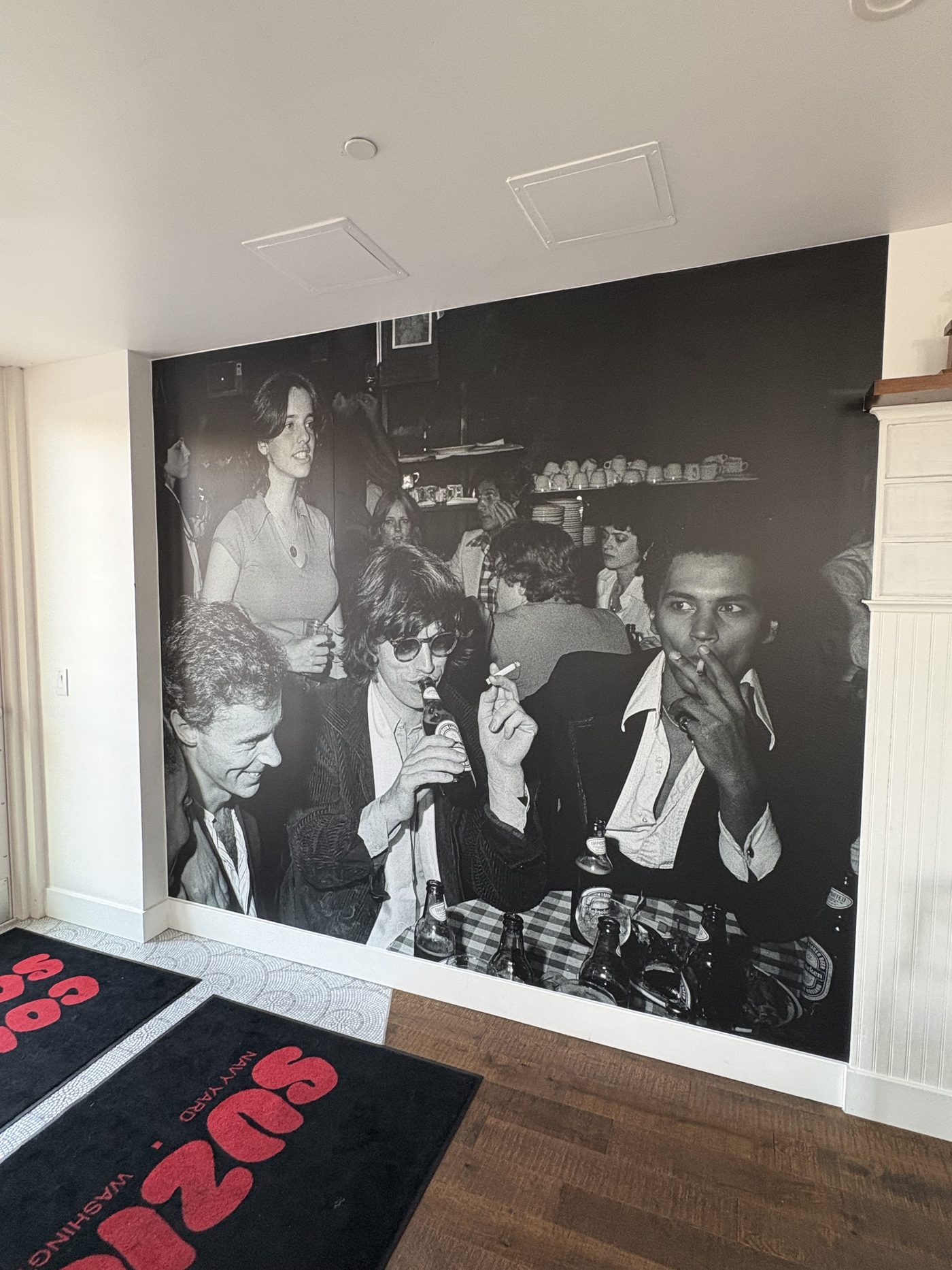 Vintage black-and-white rock 'n' roll mural on the wall at Suzie Q's